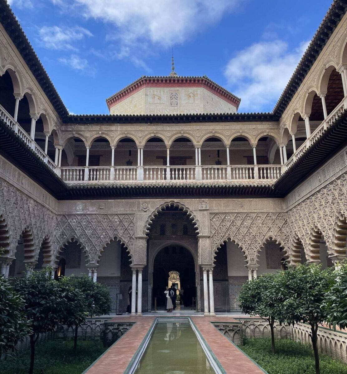 Courtyard of the Maidens with its reflecting pool at the Royal Alcázar, a highlight of the best city in Europe