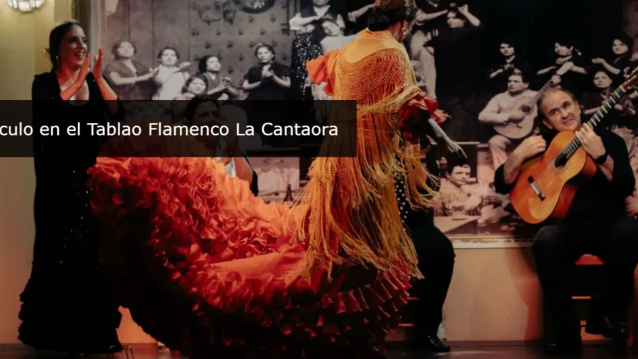 Flamenco dancer and guitarist performing in an intimate Seville tablao